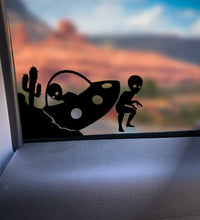 Load image into Gallery viewer, Crashed UFO Alien Corner Windshield Decal Wrangler space Sticker Easter Egg Area 51 bitcowsstickers.com