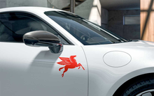 Load image into Gallery viewer, Black-and-white photo of a classic white convertible with a Pegasus decal on the front fender
